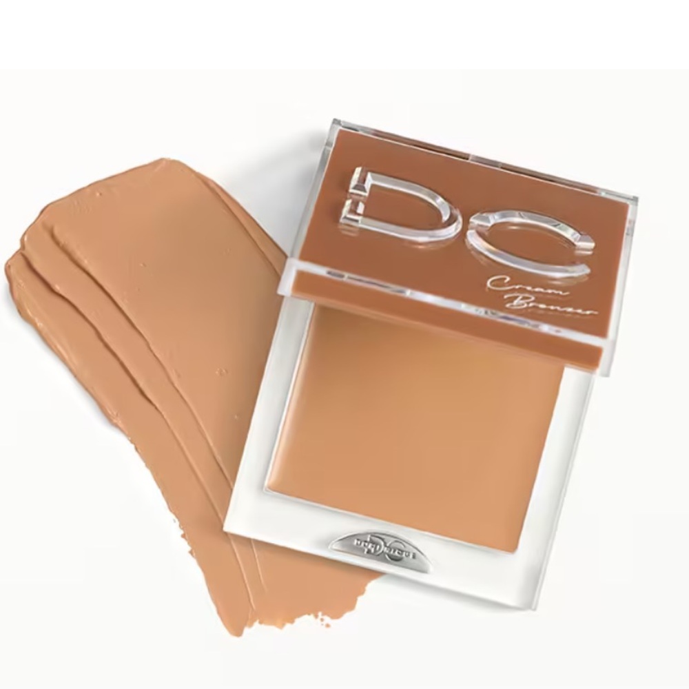 DOMINIQUE COSMETICS
Silktone Cream Bronzer in Light Tan